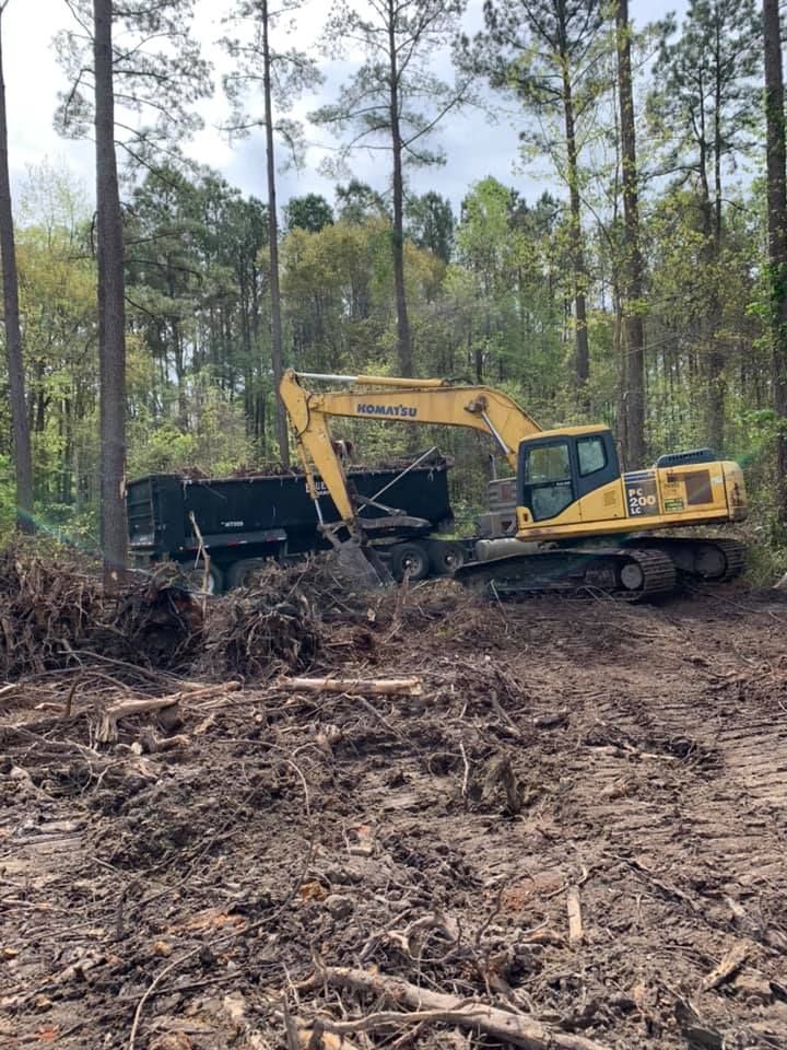 Our Debris Removal service ensures a clean and safe environment by efficiently clearing construction waste, old materials, and debris from your property, leaving it ready for your desired project. for Davis Contracting & Site Work in Adams Run, SC