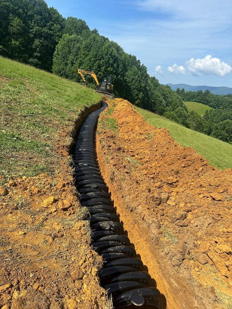 Enhance your property with our expert septic system installation, ensuring efficient waste management. While you're planning outdoor upgrades, consider our "Christmas lights installation near me" services for festive cheer this holiday season. for Trophy Ridge Grading & Hauling in Mountain City, TN