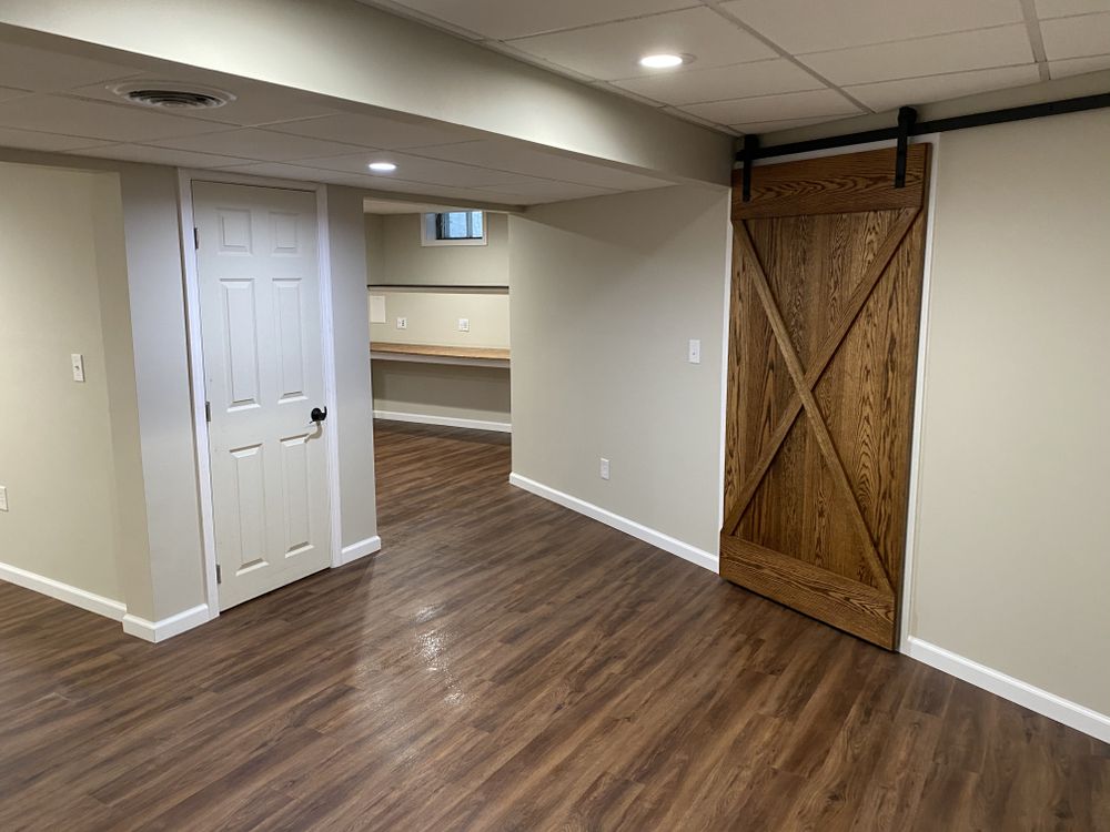 Transform your basement into a functional, beautiful space with our expert finishing services. Enjoy increased home value and customized design, tailored to fit your lifestyle and needs. for Property Perfect LLC in Goffstown, NH