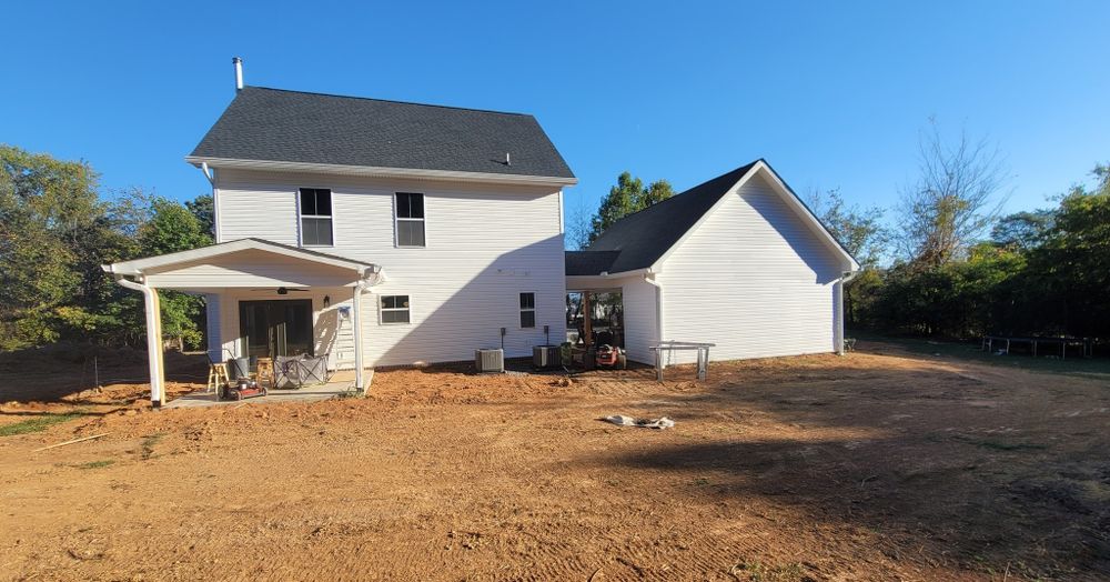 experience the art of custom home construction with our expert team, dedicated to turning your vision into reality. We deliver personalized designs, exceptional craftsmanship, and seamless project management. for Jarvis Generational Builders in Greenback, TN