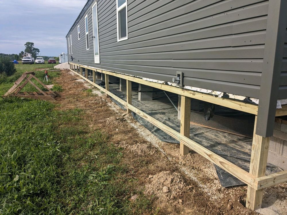 Enhance your home's curb appeal and energy efficiency with our expert vinyl siding house services, providing durable, low-maintenance solutions designed to withstand weather conditions while maintaining a beautiful appearance for years. for GT Builders in Henryville, IN