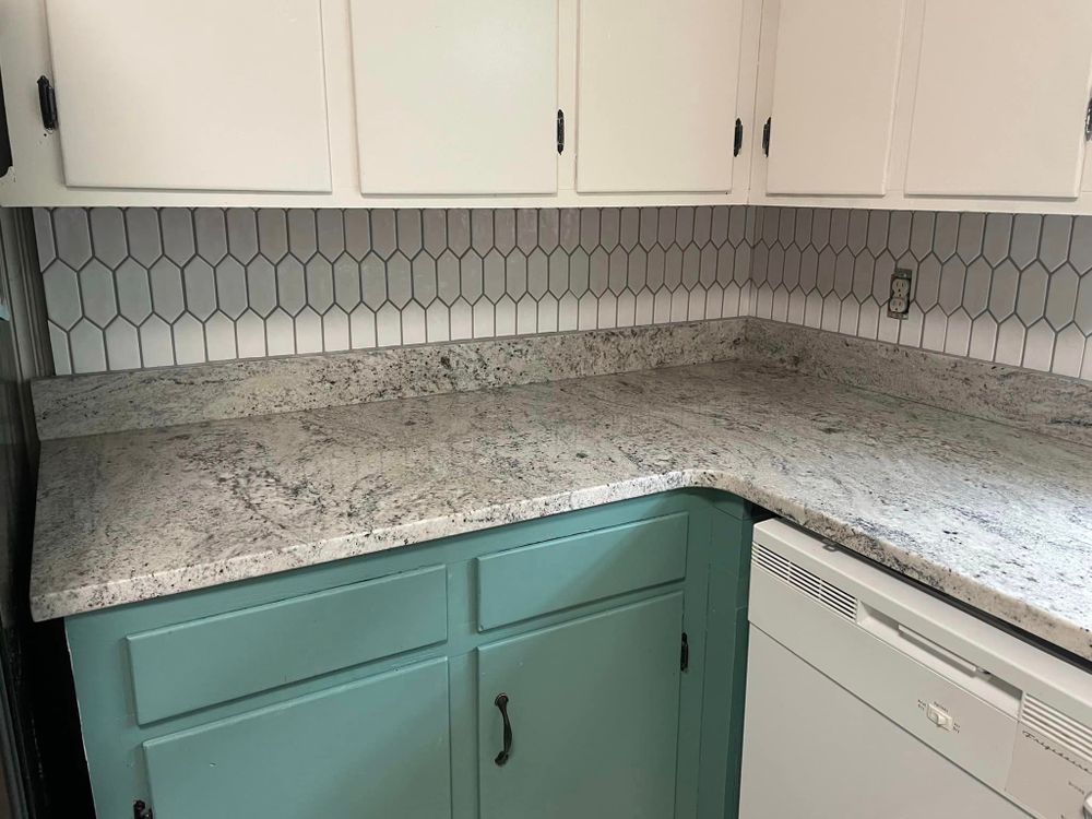 Enhance the beauty and functionality of your kitchen with our professional Kitchen Backsplash Tiling service. Our team ensures quality installation to transform your space into a stylish culinary haven. for McCollum Tile in Hartwell, GA