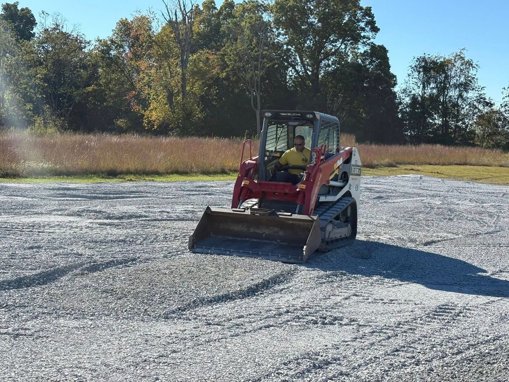 Our Grading and Leveling service ensures your land is perfectly prepared for construction or landscaping, enhancing stability while preventing drainage issues, offering a solid foundation for any future projects. for Site Solutions in Lynchburg, Virginia