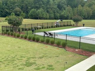 Enhance your home's curb appeal and safety with our expert commercial landscaping lighting services, providing customized illumination solutions that highlight your property's best features while increasing security and nighttime visibility. for J&J Hauling and Outdoor in Fayetteville, GA