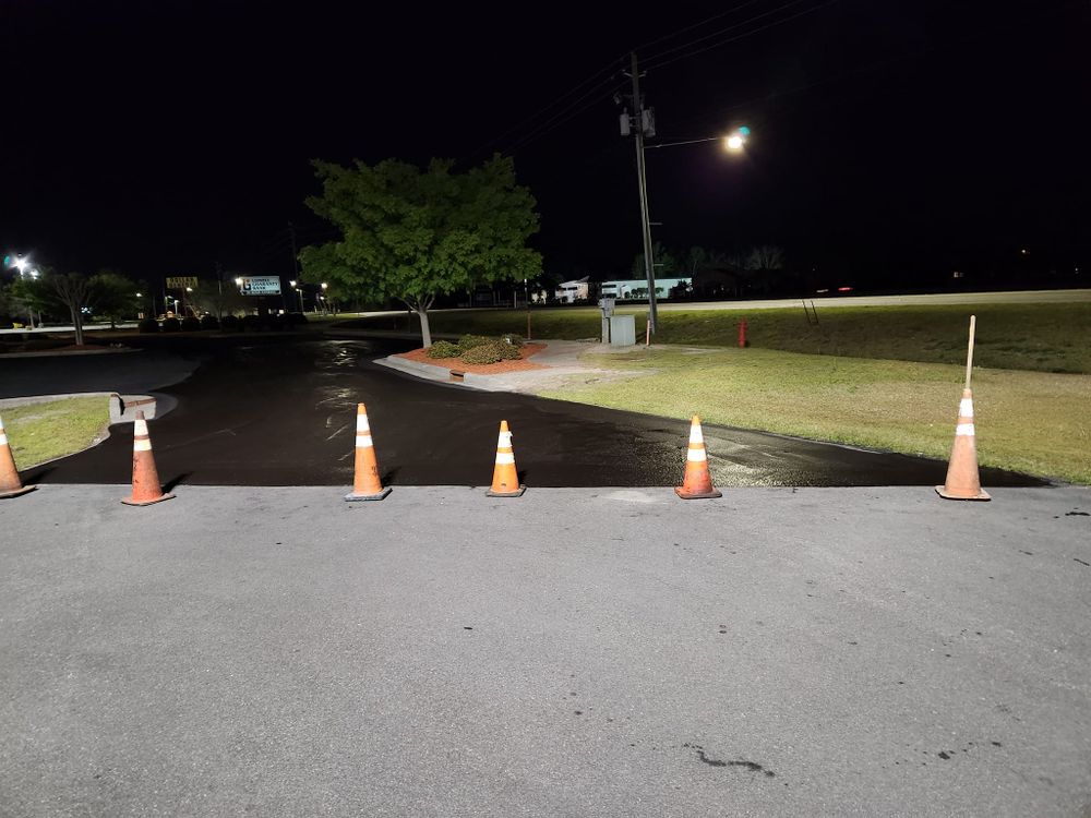 Protect your driveway with our professional sealcoating service. Extend the life of your asphalt, prevent cracks and damages, enhance curb appeal, and save money in the long run. for Southeast Sealing & Striping in Bladenboro, NC