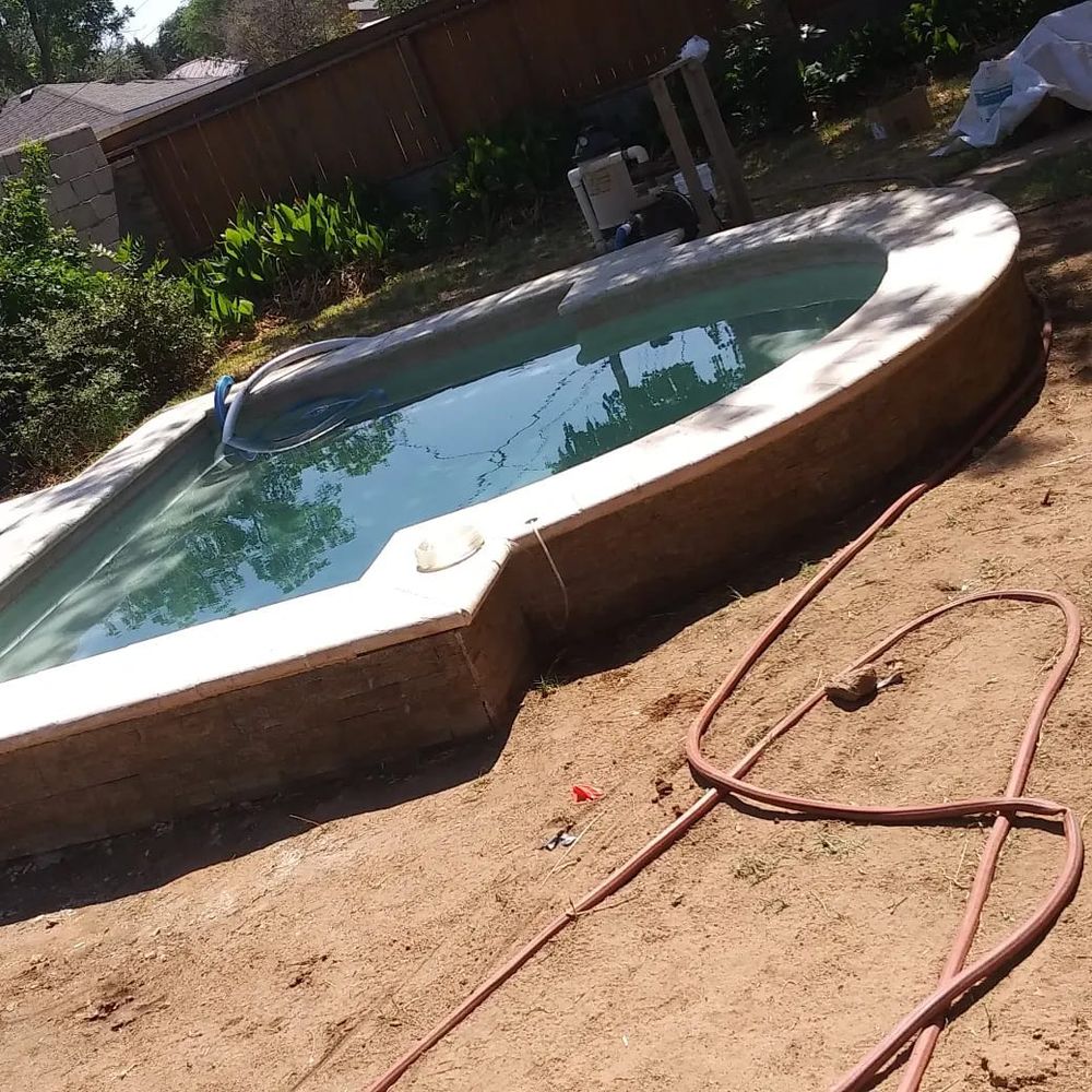 Our Pool Maintenance and Cleaning service ensures your pool remains pristine and inviting, providing regular cleaning, chemical balancing, and equipment checks to enhance the longevity and enjoyment of your outdoor oasis. for JT Pools in Midland, TX