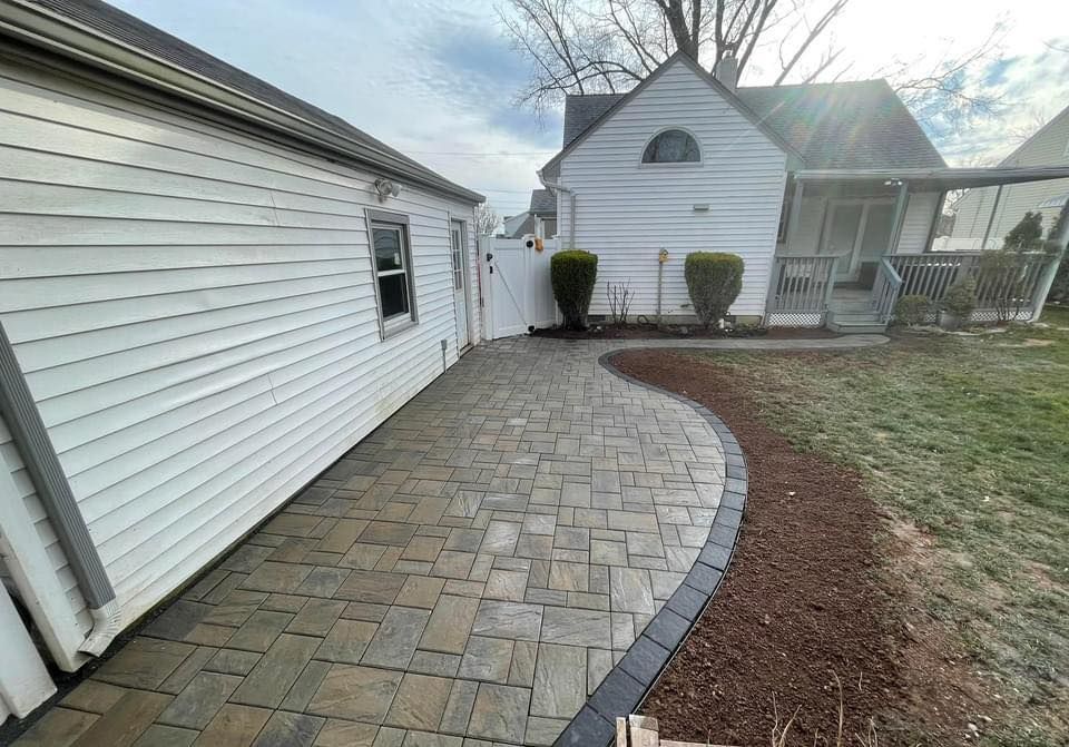 Transform your outdoor space with our expert stamped concrete installation, offering beautiful, durable surfaces that mimic natural stone or brick at a fraction of the cost, enhancing both aesthetics and value. for Valley View Landscape Contractors in Flemington, NJ