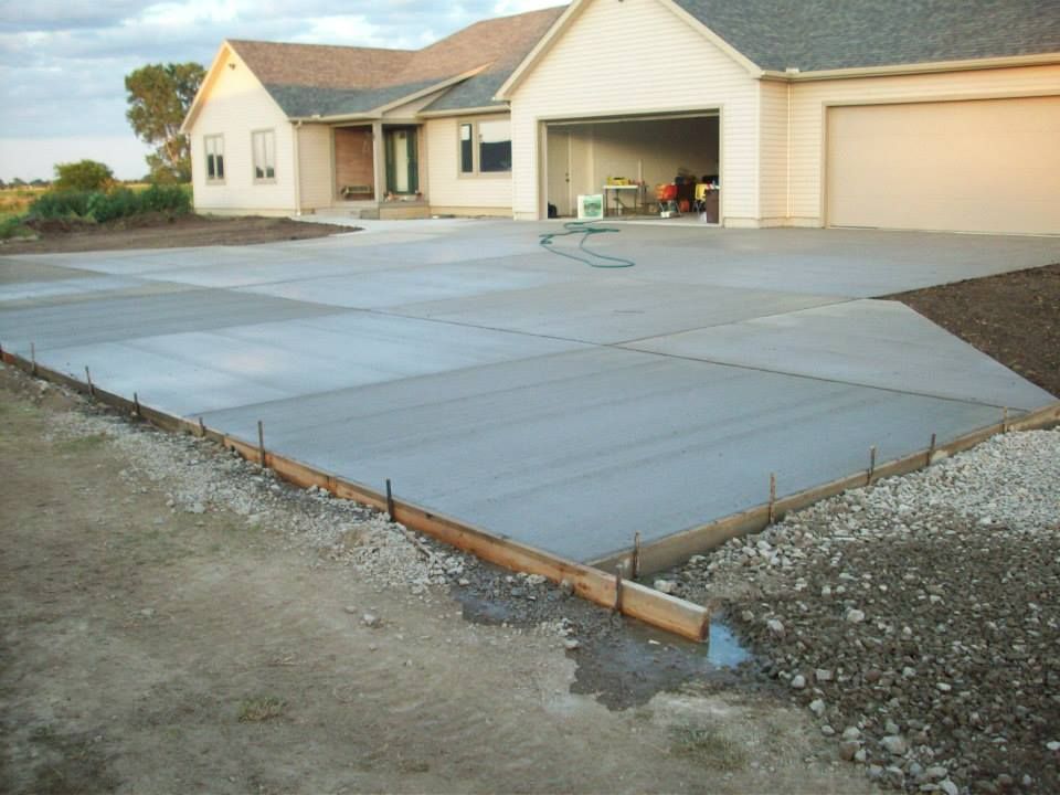 Transform your home's exterior with our expert driveway installation services. Our concrete driveways are durable, low maintenance, and designed to enhance curb appeal while adding value to your property. for Paul Turner Concrete & Excavating in Toledo, OH