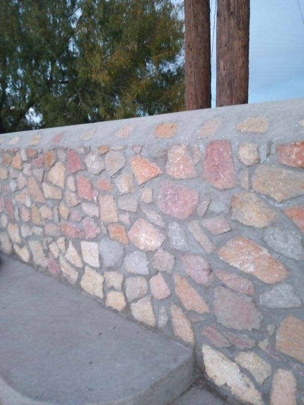 Enhance your home's landscape with our expert rockwall services. Our skilled team creates durable, eye-catching stone structures that add elegance and value to any property, ensuring quality craftsmanship and lasting beauty. for Gordo’z Concrete & Maintenance in El Paso, TX