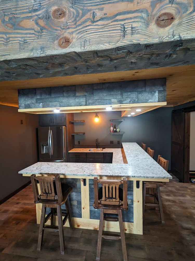 In addition to new construction, we offer a range of other services such as custom Bar and Fireplace designs to help you create your dream home. for Bnh Contractors in Cold Spring, MN