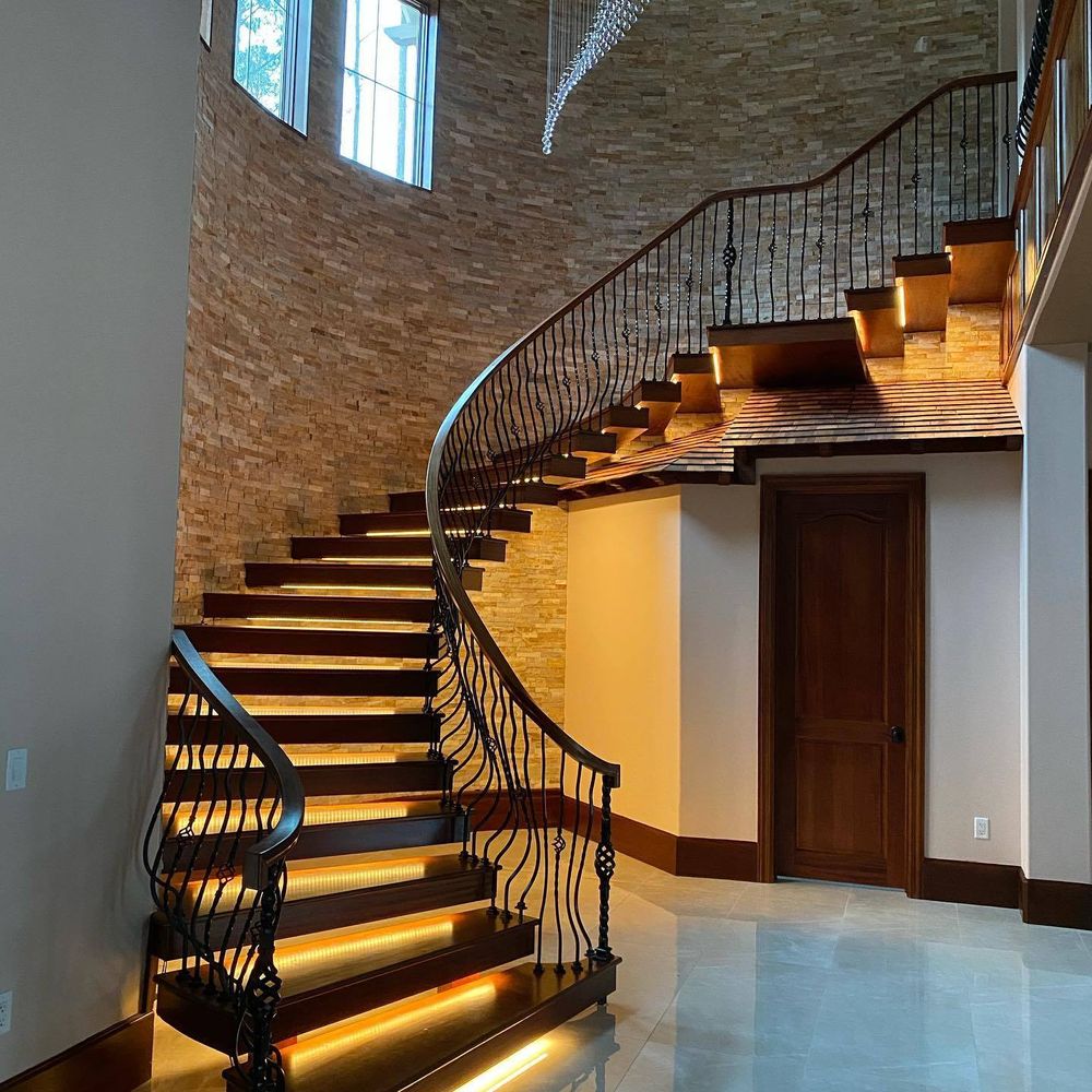 Our Spiral Stairs service offers a unique and stylish solution for homeowners looking to add elegance and functionality to their space, with expert craftsmanship and customizable designs available. for Southern Stair Builders LLC in Bluffton, SC