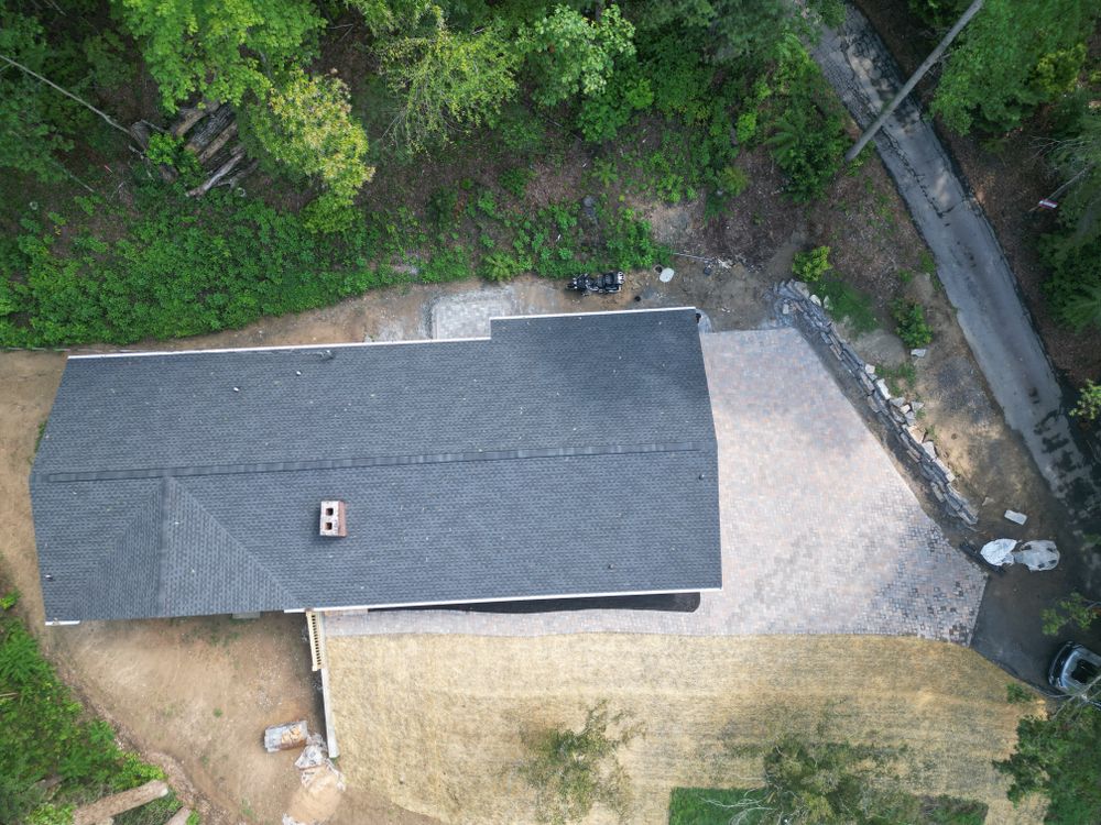 Our expert roofing services specialize in metal roofing, providing homeowners with durable, energy-efficient solutions that enhance your property's protection and aesthetic appeal while ensuring long-lasting performance and value. for JV Painting Services LLC in Hendersonville, NC