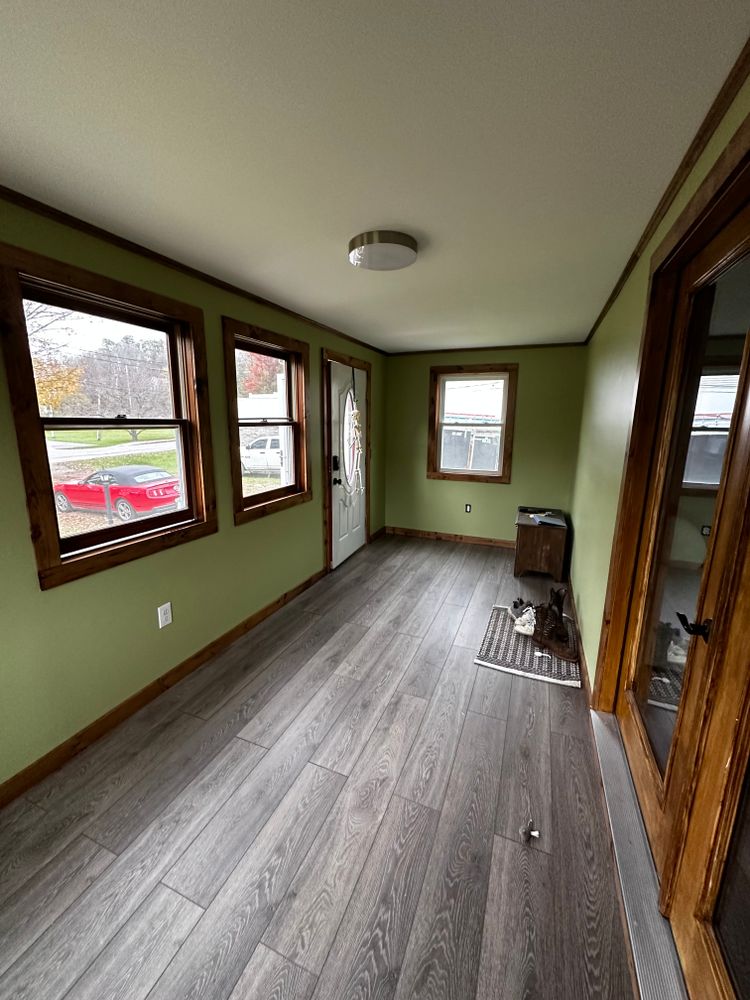 Transform your space with our premium LVP flooring services. Our expert team ensures precise installation and exceptional durability, adding style and comfort to your home’s interior effortlessly. for Jack Of All Blades in Windsor County, VT