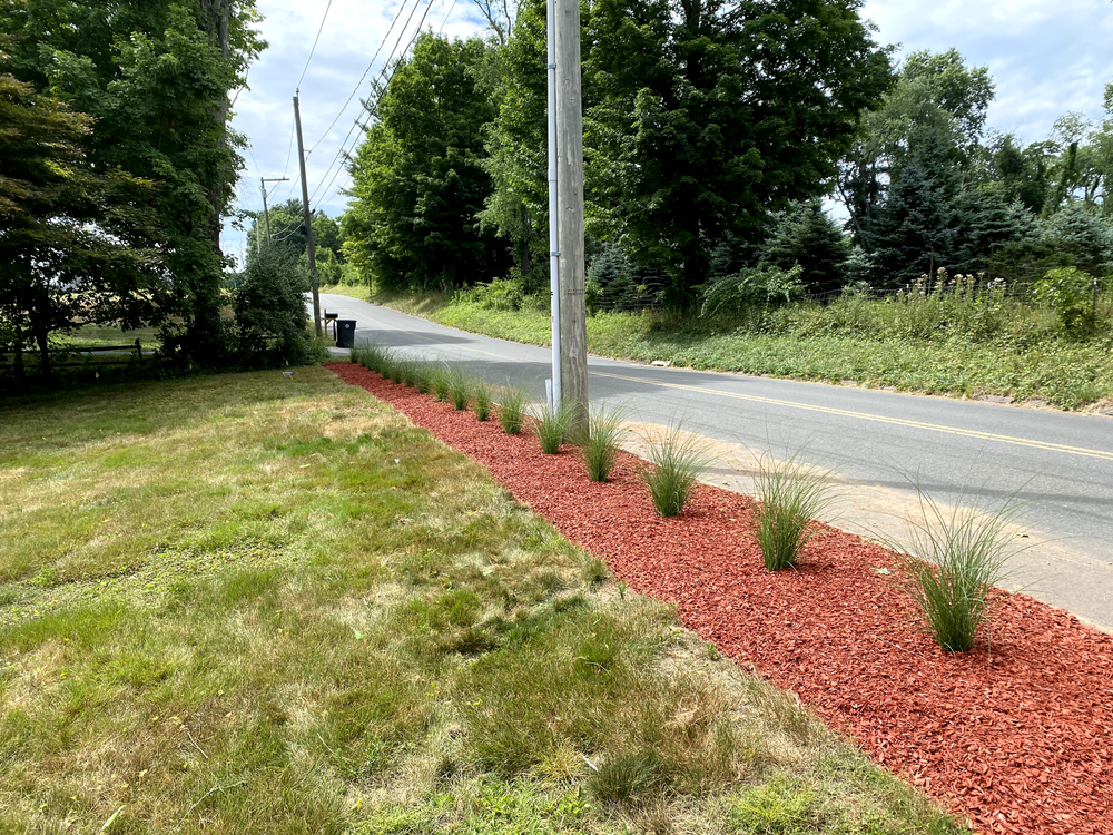 Transform your outdoor space with our expert Landscape Design & Installation service, featuring professional mulch installation to enhance garden aesthetics, improve soil health, and achieve vibrant landscape appeal year-round. for Dibs Landscaping LLC in Cheshire, CT