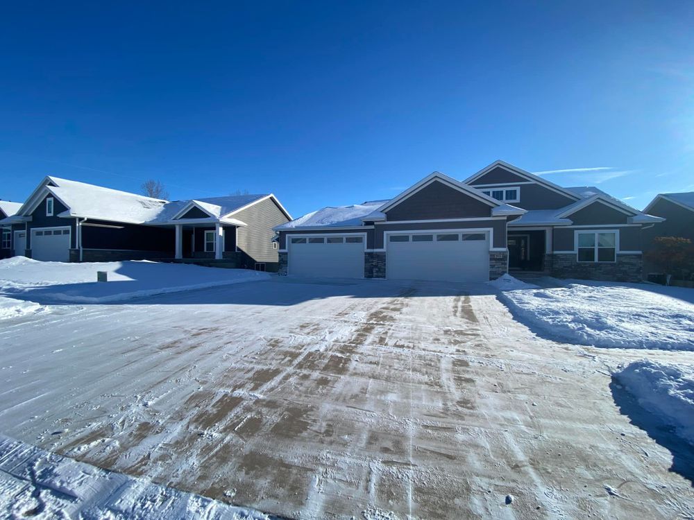 Our professional snow removal service ensures safe and efficient clearing of driveways, walkways, and sidewalks during winter months. Trust us to keep your property clear of ice and snow. for Weeds Lawn Care & Landscaping LLC  in Hiawatha, IA