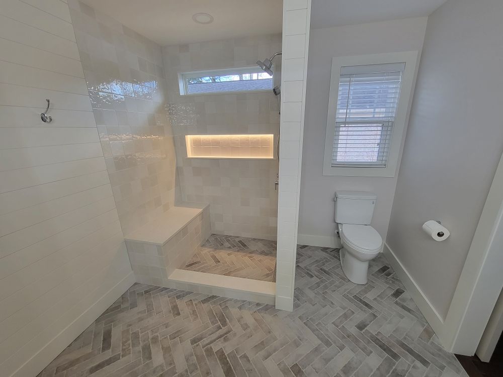 Our Bathroom Renovation service offers homeowners a comprehensive solution to transform their outdated or inefficient bathrooms into beautiful, functional spaces that meet their specific needs and preferences. for GVL Renovations in Greenville, SC