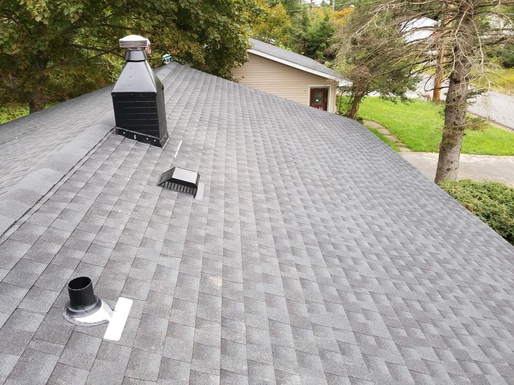 Our expert shingle roofing service ensures durability and aesthetic appeal, providing homeowners with reliable protection against the elements while enhancing their home's curb appeal and overall value. for Kalthoff Home Improvement in Parksville, NY