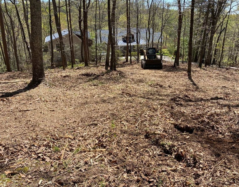 Our mulching service efficiently clears land by grinding trees and vegetation into nutrient-rich mulch, promoting soil health and reducing erosion while maintaining the natural aesthetic of your property. for Triple P Excavation in Atlanta, GA