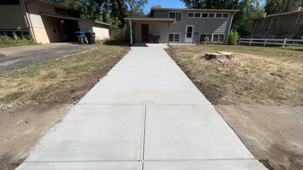 Our concrete driveways provide durability, aesthetic appeal, and value to your home. Trust our professional team for top-quality installation that enhances curb appeal with a smooth, long-lasting finish. for Premium Concrete Construction in Topeka, KS