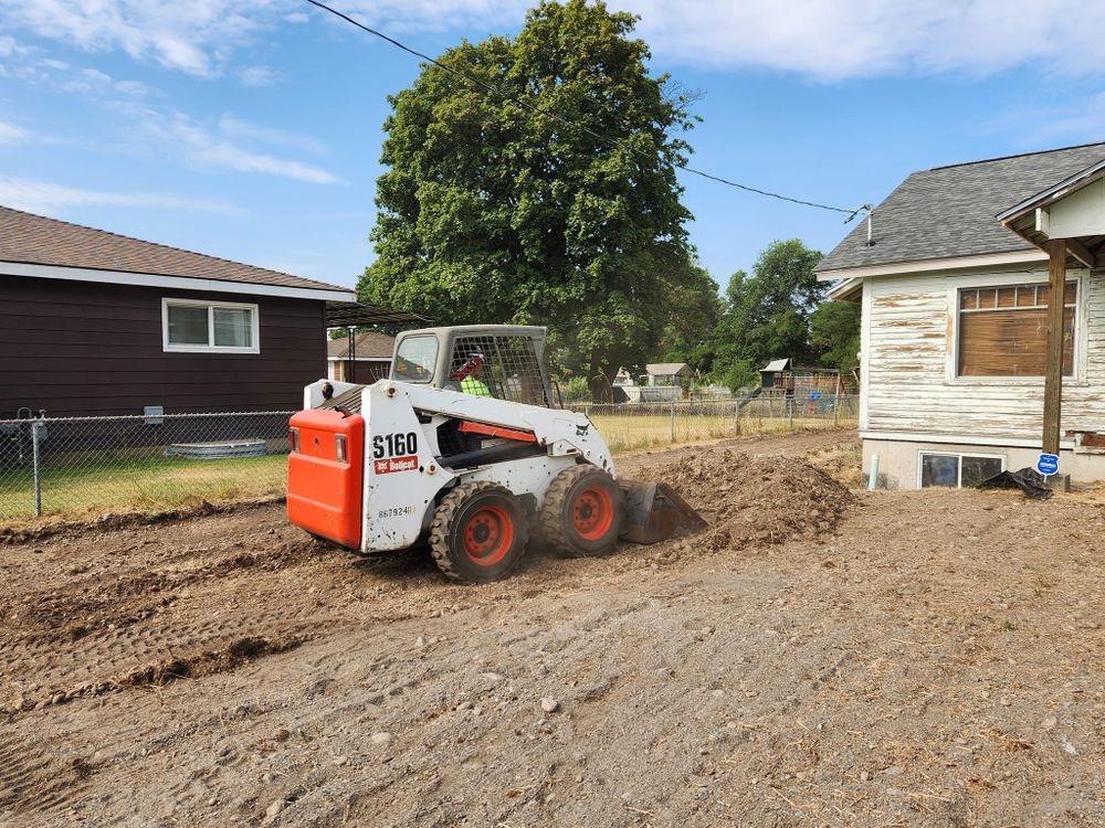 Our Skid Steer Work service offers precise and efficient excavation for homeowners, handling tasks like grading, clearing debris, and landscaping to enhance your property with professional expertise and reliable equipment. for Model A Excavating in Spokane Valley, WA