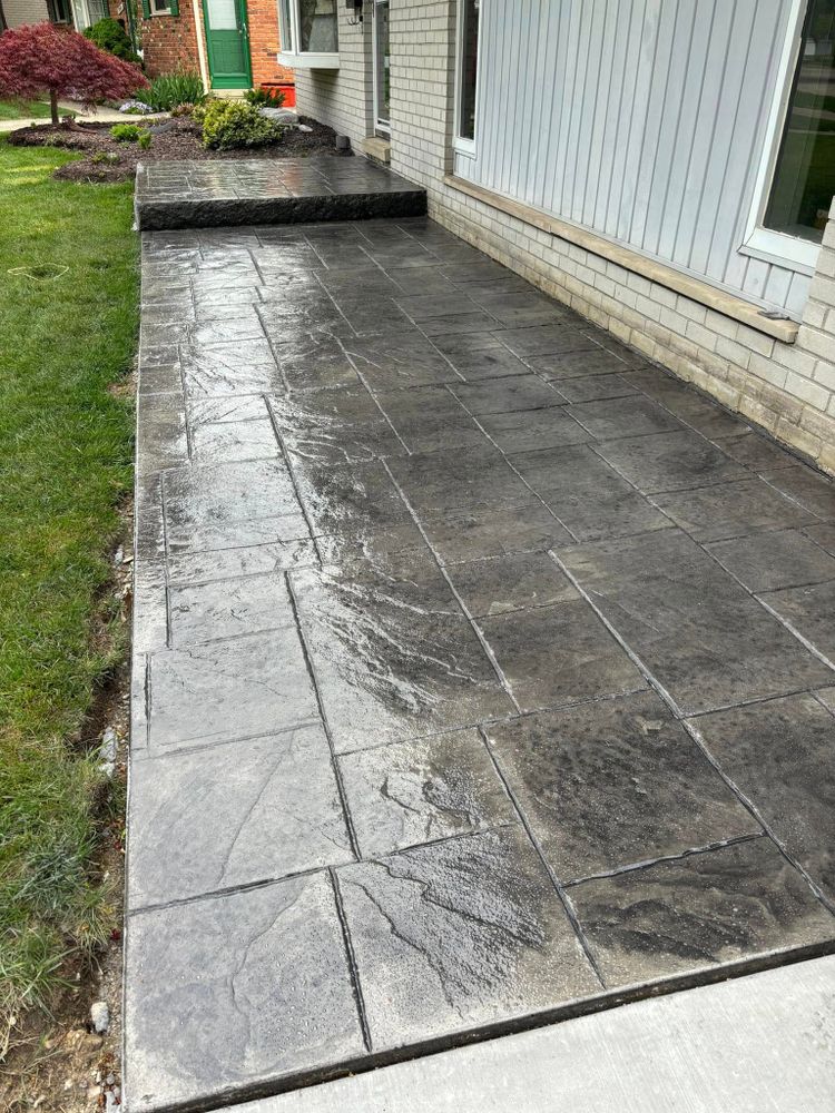 Transform your outdoor space with our expert stamped concrete installation, offering beautiful, durable surfaces that mimic natural stone or brick at a fraction of the cost, enhancing both aesthetics and value. for DeLeòn Cement in Detroit, MI