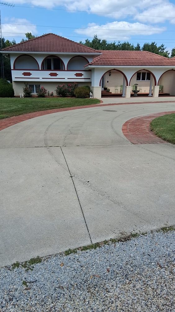 Enhance your home's curb appeal with our driveway and sidewalk cleaning service. Our professional pressure washing team effectively removes dirt, grime, and stains, ensuring a spotless and inviting outdoor space. for Haskett Pro-Wash LLC in Newton, IL