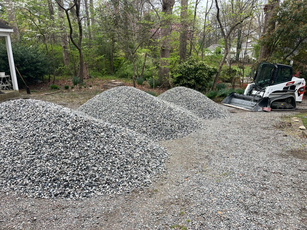 Transform your outdoor space with our reliable gravel delivery and installation service, offering high-quality materials and expert craftsmanship to enhance the beauty and functionality of your landscape effortlessly. for Atlas Home Services in Mechanicsville, VA