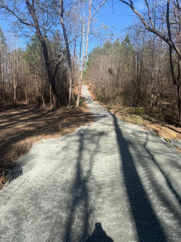 Our grading and leveling service creates a stable, properly sloped surface for construction, drainage, and landscaping, helping homeowners prevent water issues, improve usability, and prepare their property for lasting results. for Hunt’s Hauling & Landworks LLC in Danville, VA