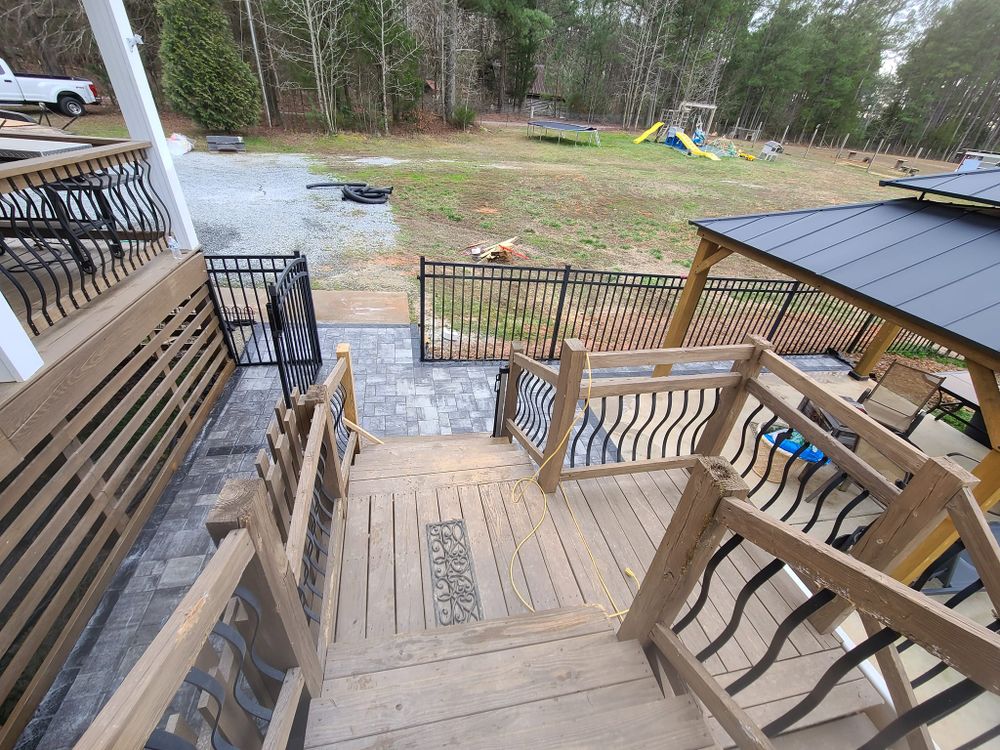 Our Deck and Patio Construction service offers expert patio design & construction, enhancing outdoor spaces with durable materials and stunning aesthetics for homeowners seeking to create a perfect backyard retreat. for Westscape Designs in Lake Gaston, NC