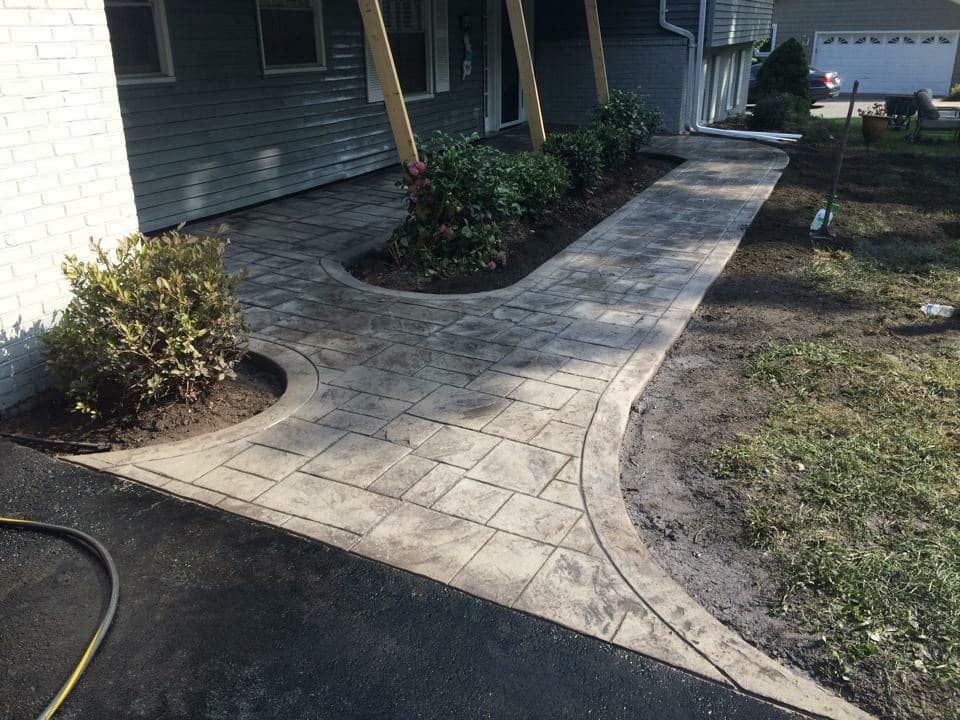 Our Skid Steer Work service offers efficient land clearing, grading, and site preparation, ensuring a smooth foundation for your concrete projects while enhancing the overall appeal and functionality of your outdoor space. for Dixie Concrete Masonry LLC in Saint Leonard, MD