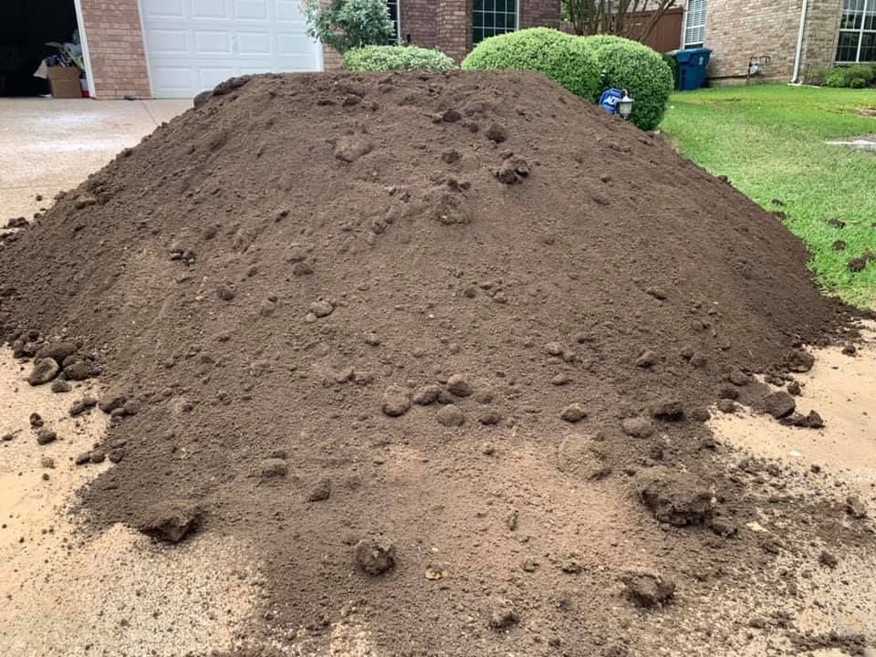 Our Dirt Installation service includes precise grading and smoothing of your property's landscape, ensuring a stable foundation for future projects like gardens, lawns, or driveways. Contact us for expert assistance! for Sand And Gravel Solutions in Nevada, TX