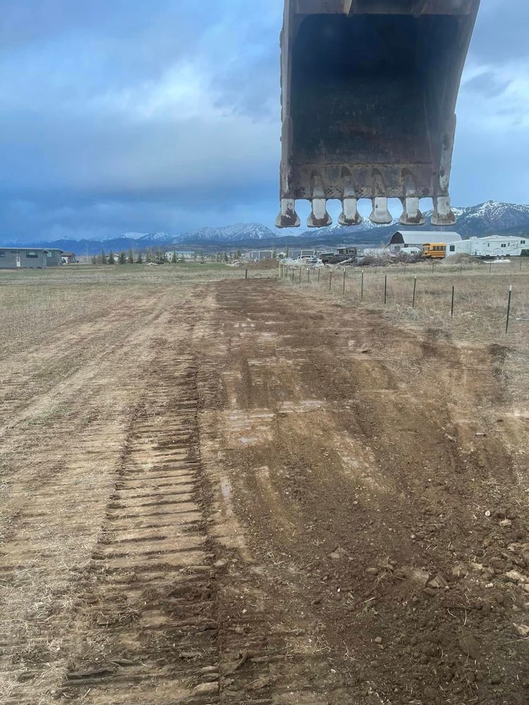 Our Site Grading service ensures your property has a solid foundation by leveling and preparing land, enhancing drainage, stability, and safety for any construction or landscaping project. for Hansen Earth Works in Jackson, WY