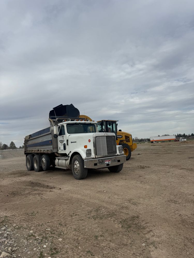 Our Debris Removal service efficiently clears construction and landscaping waste, ensuring a clean and safe environment. Trust our professional team to handle debris swiftly, enhancing your property's appearance and functionality. for Steed Trucking and Excavation in Rexburg, ID