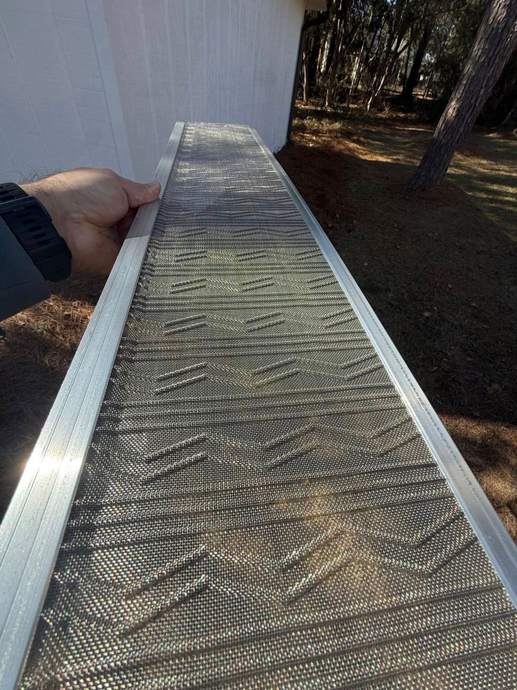 Our gutter guard install service protects your home from debris build-up, ensuring efficient water flow. Trust our expert team for a hassle-free installation that prolongs your roof's lifespan and enhances home maintenance. for Dollar Roofing & Gutters in Jeffersonville, GA