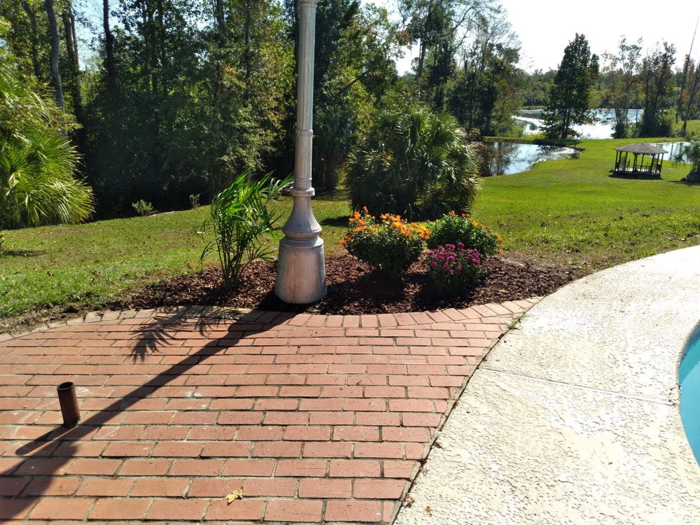 Transform your outdoor space with our expert Garden Design service, creating stunning, personalized landscapes that enhance your home's beauty and functionality while reflecting your unique style and preferences. for Landrum’s Lawn & Tractor Services in Blountstown, FL