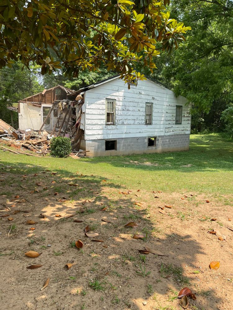 Our Land Clearing & Demolition service expertly transforms your property by removing unwanted structures and vegetation, ensuring a clean slate for new projects while prioritizing safety, efficiency, and environmental responsibility. for Maness Trucking & Excavation in Lexington, TN
