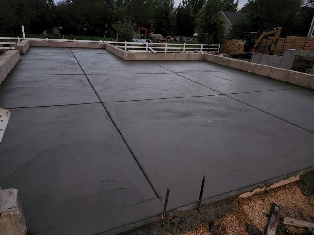 Our Concrete Slab Construction service provides durable, expertly crafted slabs ideal for foundations, driveways, or patios. We ensure high-quality materials and professional installation to meet your specific needs and enhance your home's value. for UC Concrete in Lehi, UT