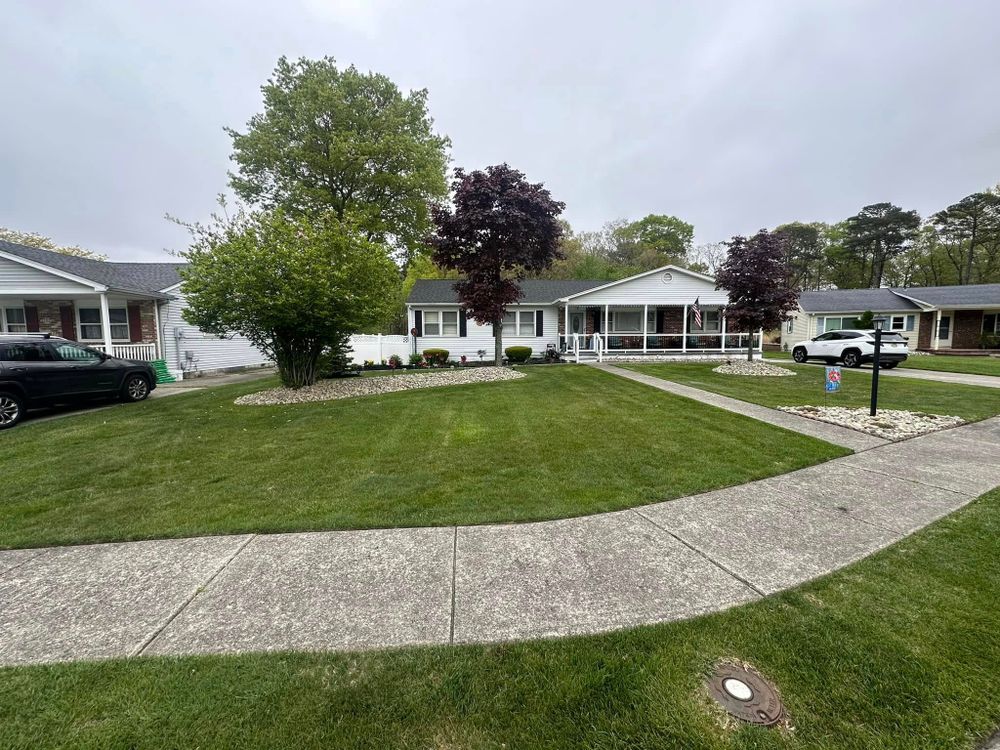 Enhance your home's beauty with our expert Flower Beds service, offering custom design and professional planting to ensure vibrant blooms that transform your outdoor space into a stunning and inviting oasis. for GT Lawn Care in Egg Harbor Township, NJ