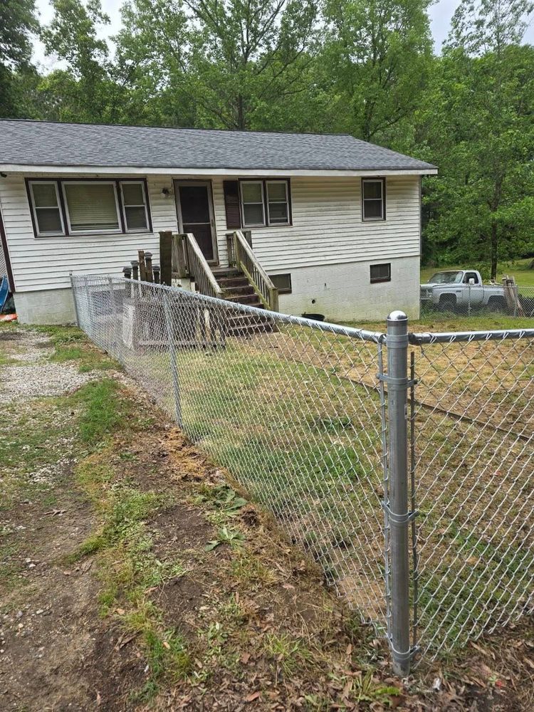 Enhance your home's security and curb appeal with our durable chainlink fencing solutions. Offering professional installation, we ensure strength, affordability, and a stylish boundary that complements any landscape design. for Innovative Enclosures in Mechanicsville, VA