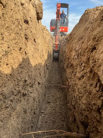 Our trenching service expertly creates precise trenches for utilities or drainage systems in your yard. We ensure minimal disruption while delivering efficient and reliable solutions tailored to meet your specific needs. for STARR CORE LLC in Rio Grande City, TX