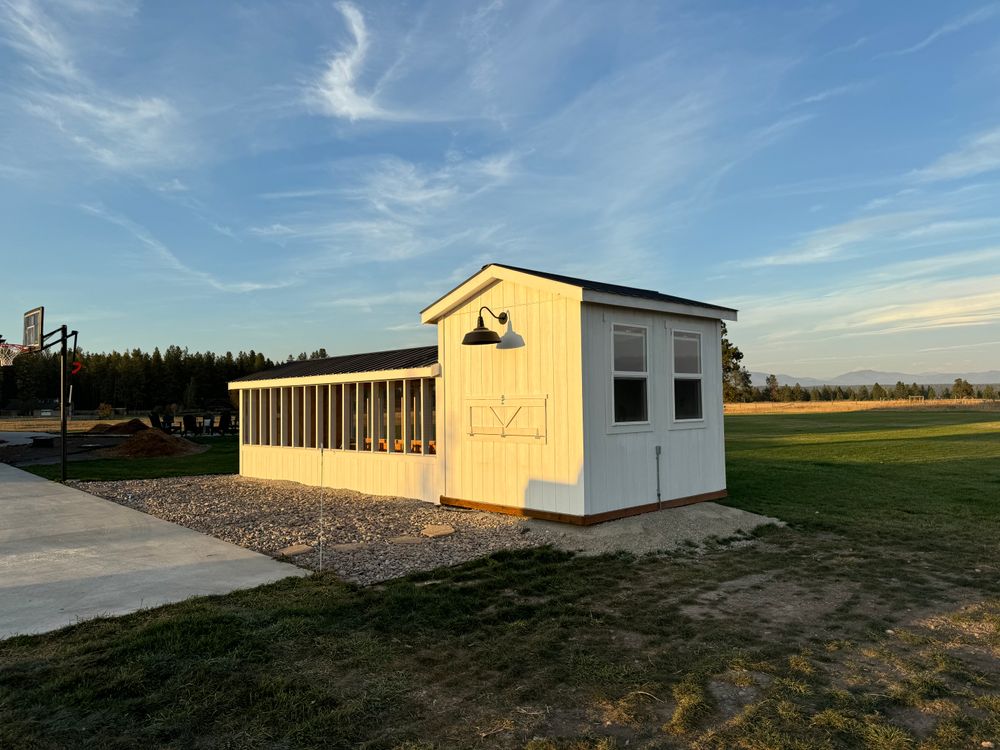Enhance your backyard with our custom-designed chicken coops, offering a safe and stylish home for your flock. Our durable, eco-friendly structures seamlessly blend functionality with aesthetics to suit any homeowner's needs. for Rocky Mountain Shed Builders in Whitefish, MT