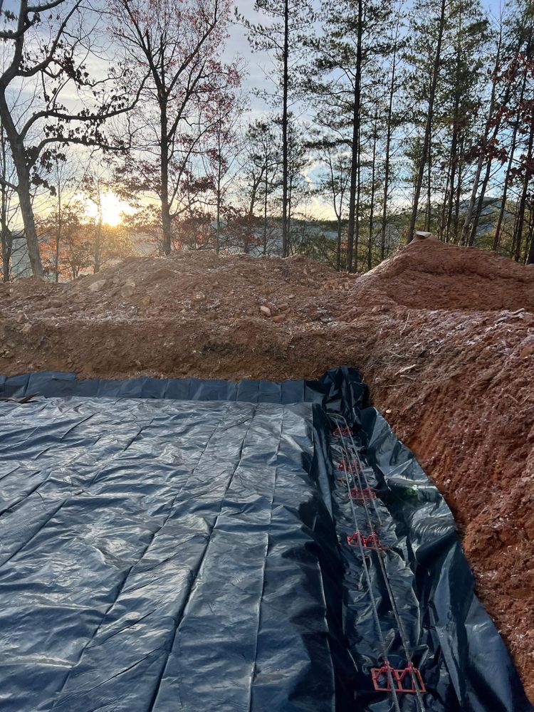 Our Land Clearing service efficiently removes trees, stumps, and debris to prepare your property for construction or landscaping projects, enhancing safety and ensuring a clean slate for your future plans. for Dutch Mountain Excavating in Sevierville, TN