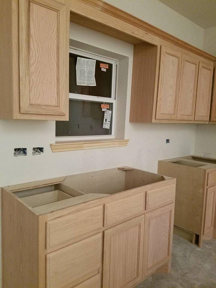 Our Custom Cabinet Installation service offers homeowners tailored solutions with expert craftsmanship to enhance the beauty and functionality of their space, creating a personalized and high-quality storage solution. for Omega Granite LLC in Ravenna, TX