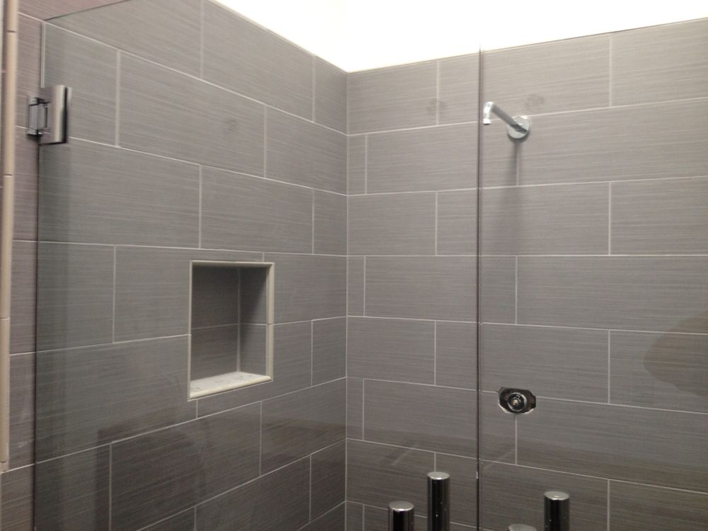 Transform your bathroom into a modern, functional space with our expert renovation services. We customize designs to fit your style and budget, ensuring quality craftsmanship and exceptional customer satisfaction every step of the way. for Olympic Construction in Chandler, AZ