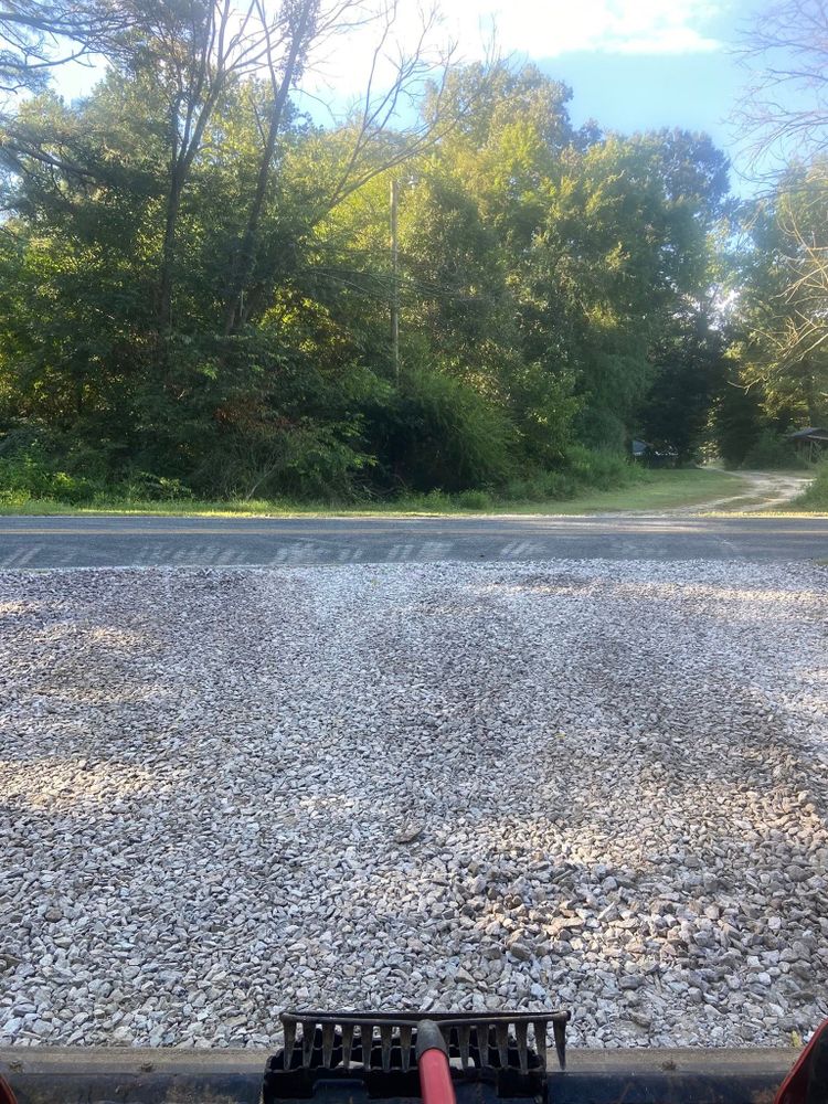 Our Leveling service ensures a stable foundation for your construction projects by expertly smoothing and grading the land, preventing future issues and enhancing the longevity of your property. for Upchurch Property Management in Vass, NC