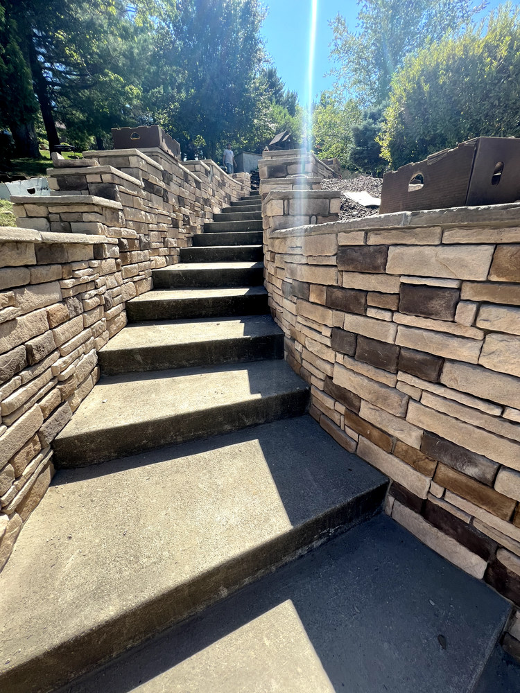 Enhance your outdoor space with our expert hardscape installation services, specializing in durable retaining walls and garden enclosures that blend functionality with aesthetic appeal to transform your home's landscape beautifully. for Accent Stone in Shelocta, PA