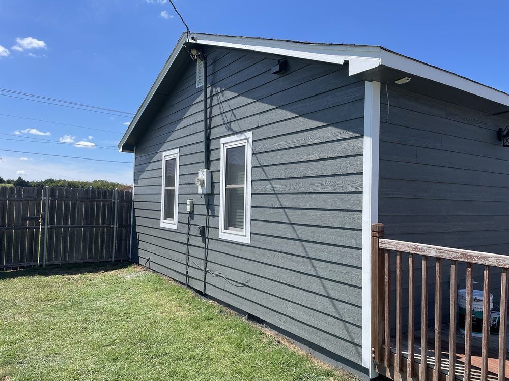 Enhance your home's curb appeal with our expert vinyl siding house services, ensuring durability and aesthetic beauty. Our professional team delivers top-tier craftsmanship for a transformative exterior upgrade tailored to your needs. for Honeycomb Remodeling in Roff, OK