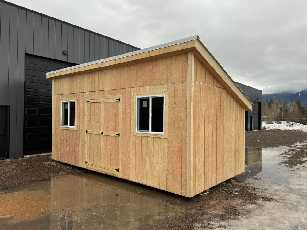 Our Single Pitch Shed offers a modern, sleek design perfect for any backyard. This stylish and versatile storage solution combines functionality with aesthetics, ensuring your belongings are secure and easily accessible. for Rocky Mountain Shed Builders in Whitefish, MT
