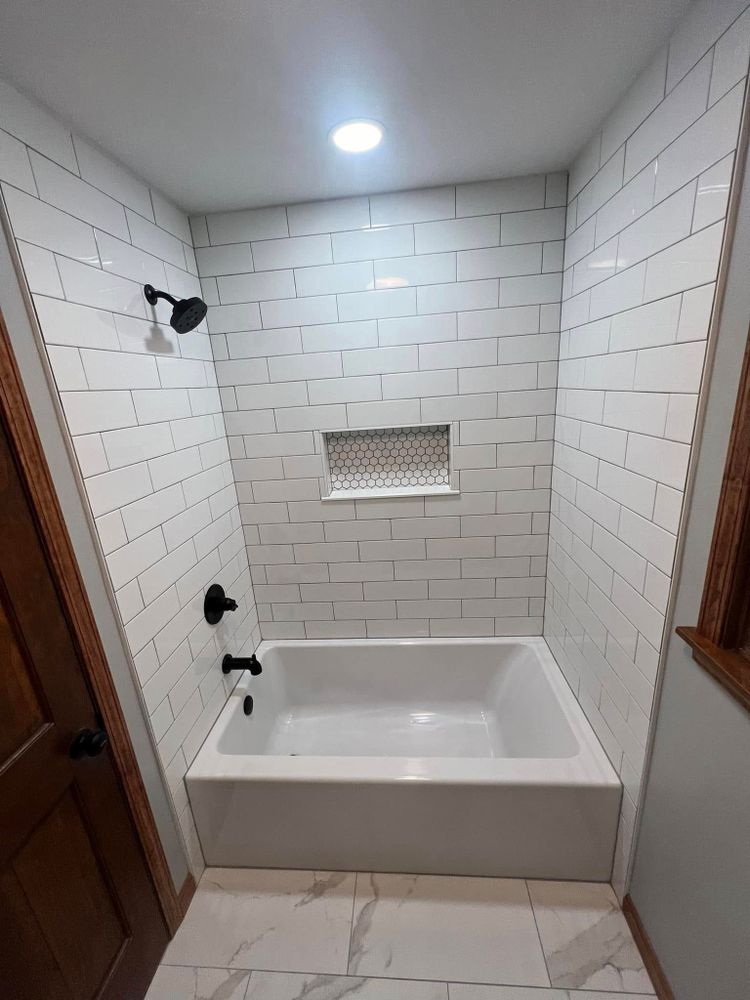 Our professional bathroom renovation service transforms your space with modern designs, quality materials, and expert craftsmanship, ensuring a functional and beautiful bathroom tailored to your unique style and needs. for Landmark Construction in Elkhart, IN