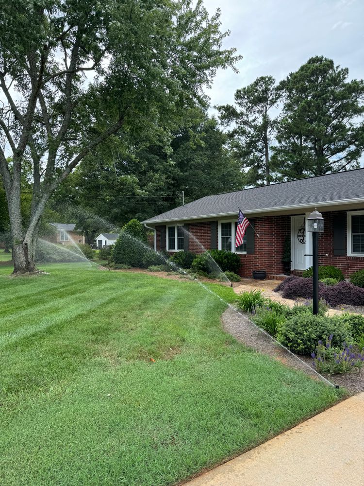 Our Irrigation Installation service ensures efficient watering of your landscape to protect and nourish plants. Enhance the beauty of your yard with our precise irrigation systems, complemented by mulch installation for optimal results. for Peach State Landscaping in Hartwell, GA